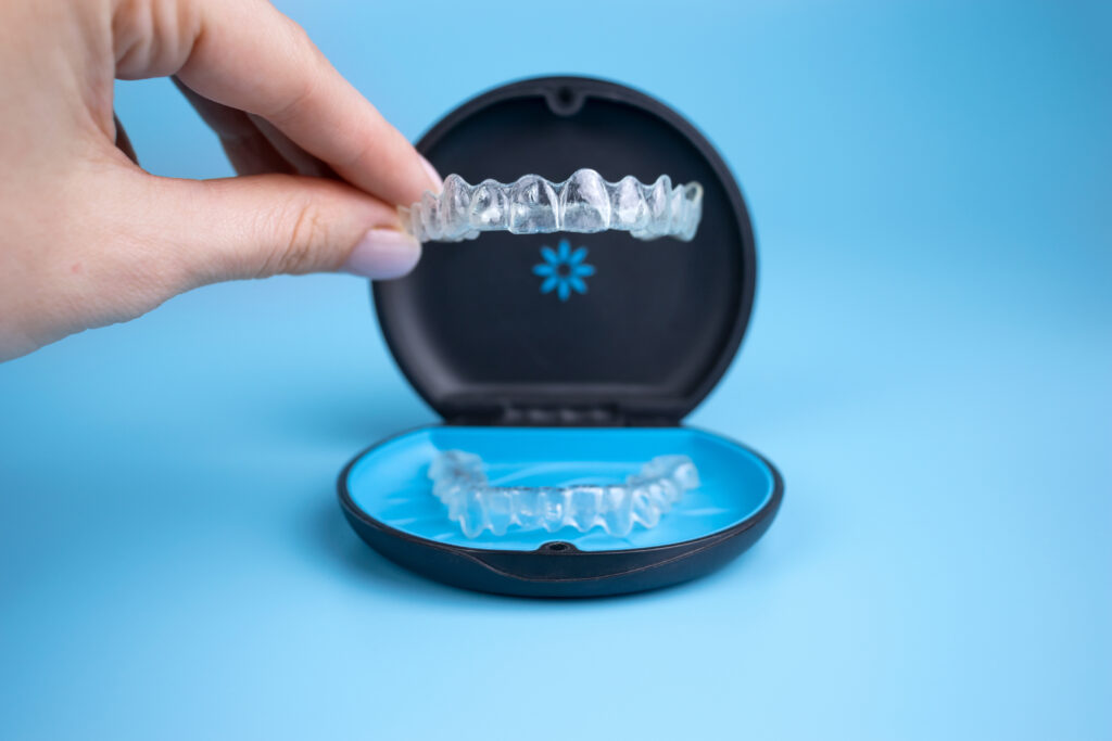 Clear dental aligner and storage case