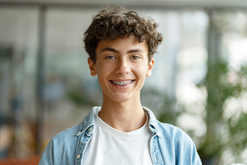 Boy smiling with braces